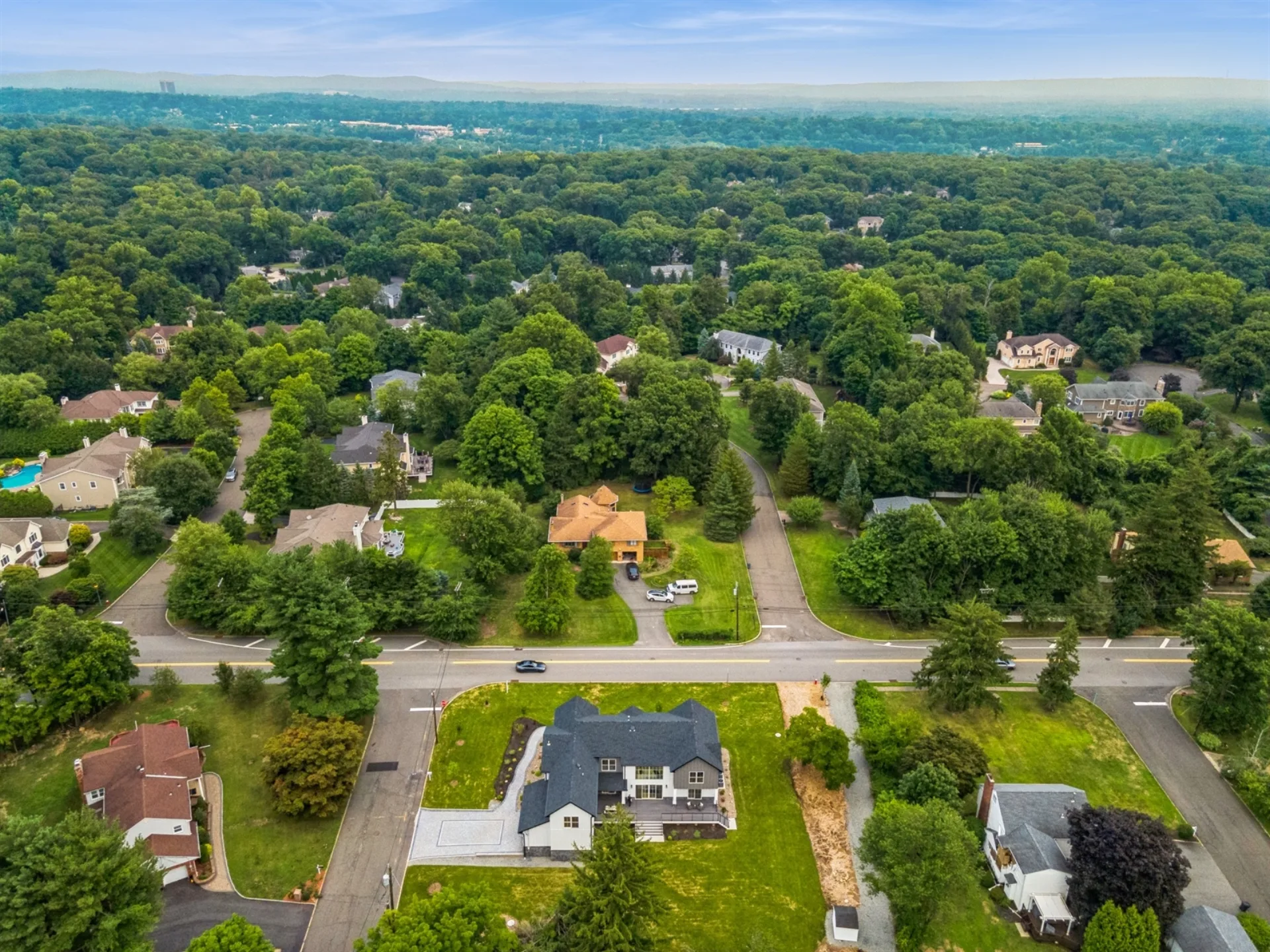 Aerial of Build Better Live Happier luxury custom home in Bergen County, NJ