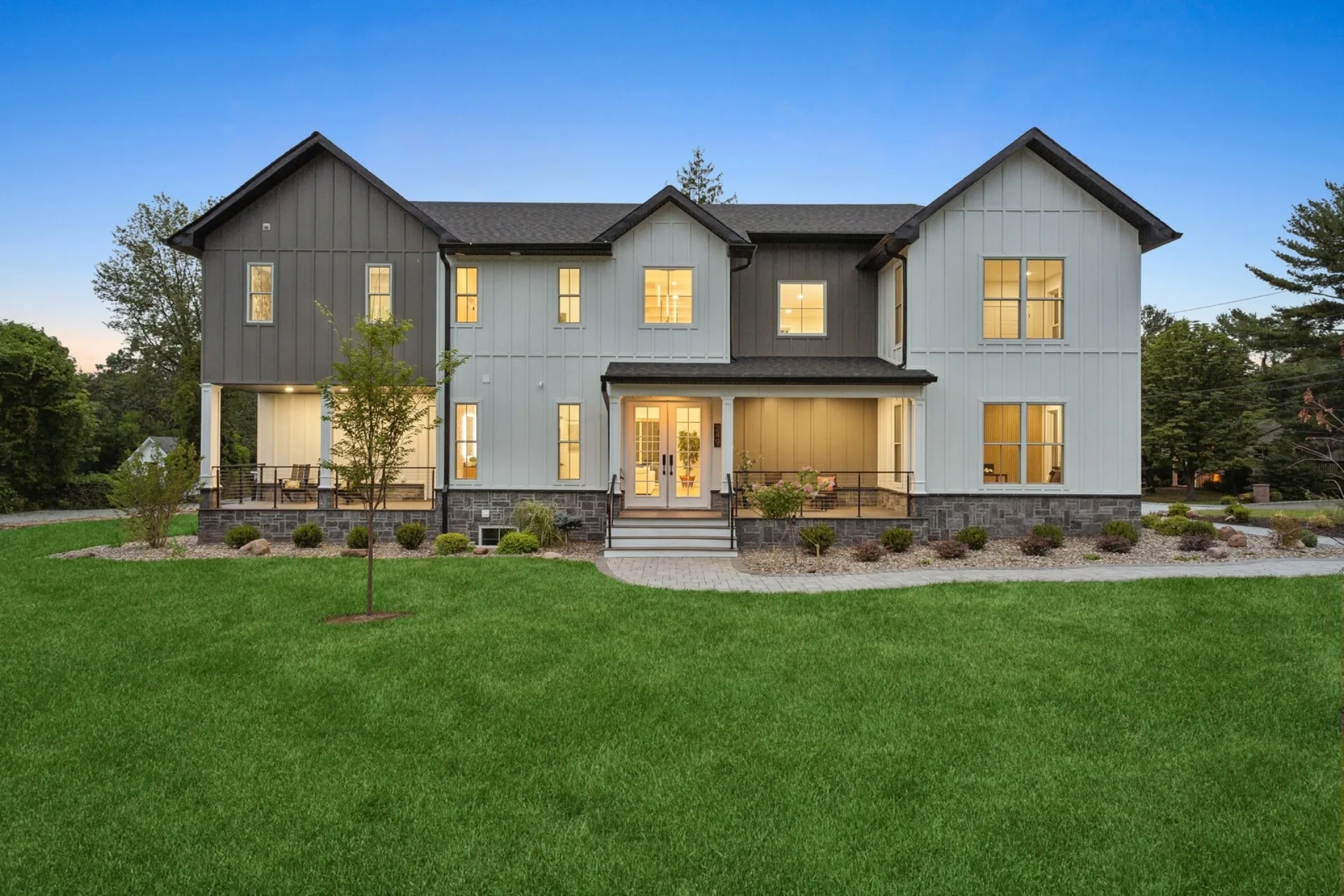 Luxury custom residence at twilight by Build Better Live Happier — Woodcliff Lake, NJ