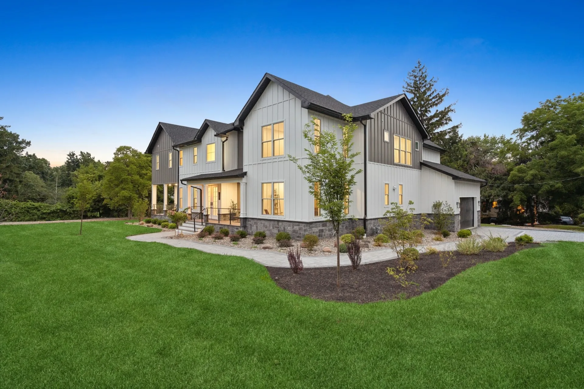 Luxury custom home at twilight by Build Better Live Happier — Bergen County, NJ