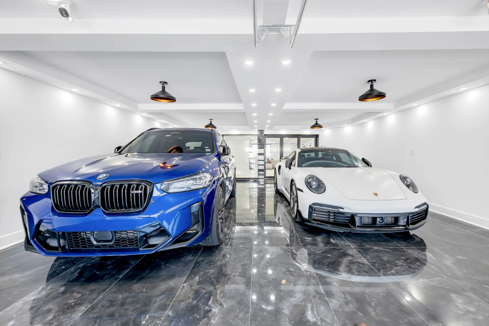 Showroom-finish garage with polished stone floor after renovation