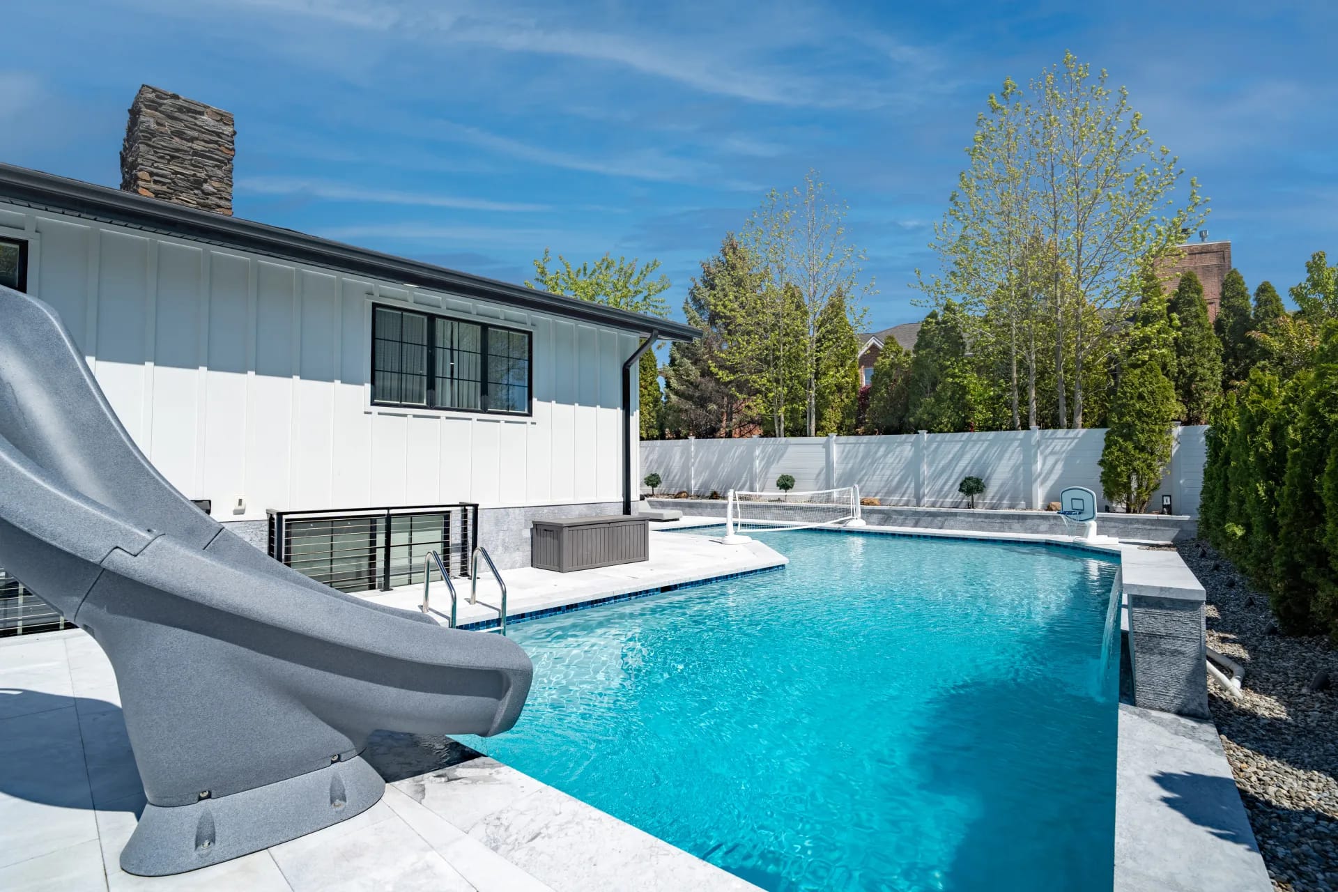 Renovated backyard pool with slide, new patio, and landscaping — Englewood, NJ