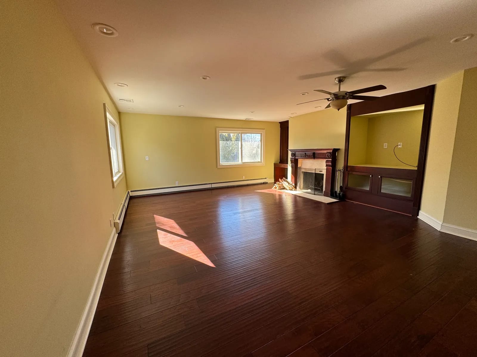 Living room fireplace before renovation