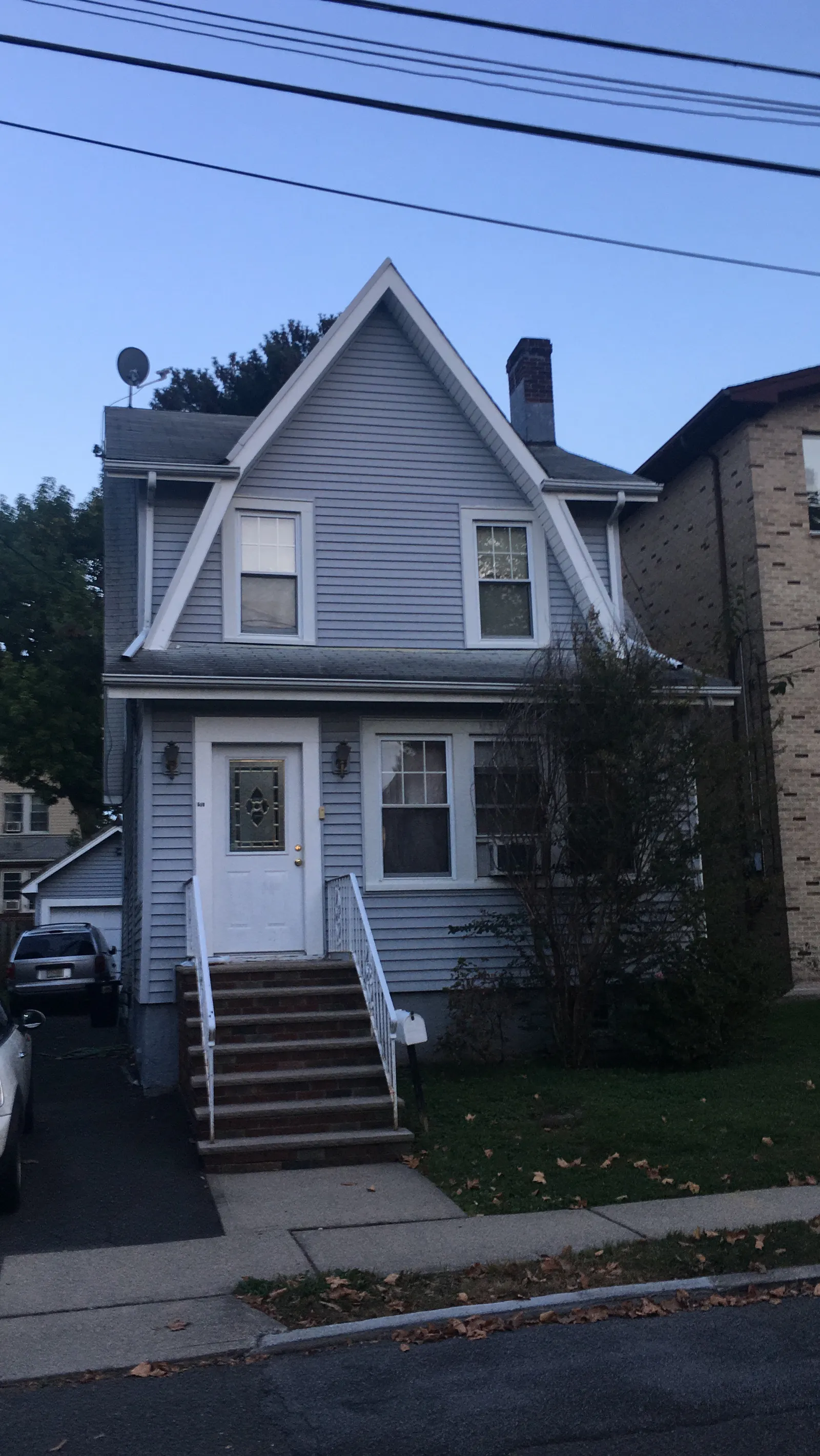 Cliffside Park home before renovation — original facade