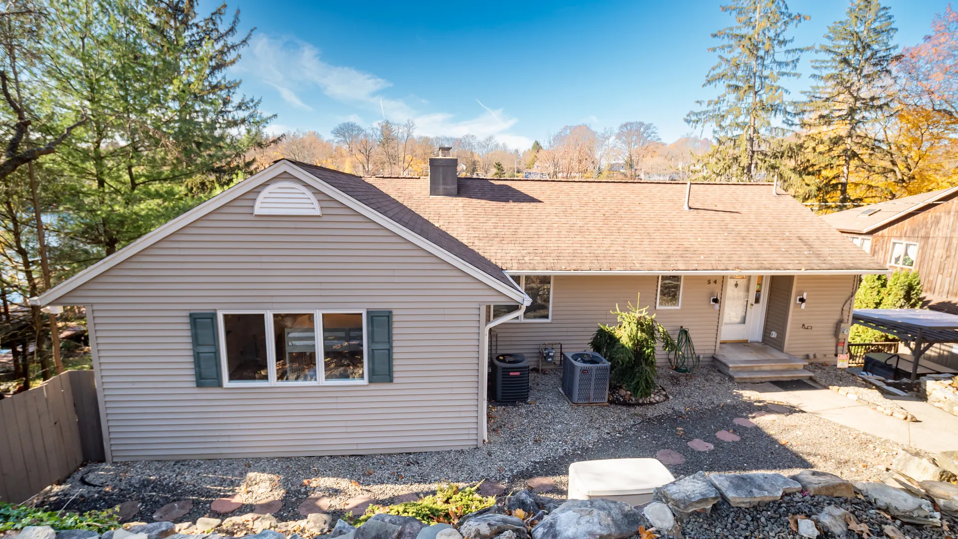 Elevated front view of the renovated lakefront home