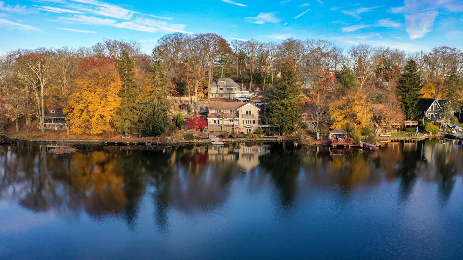 Lakefront home — West Milford, NJ — aerial view over the lake