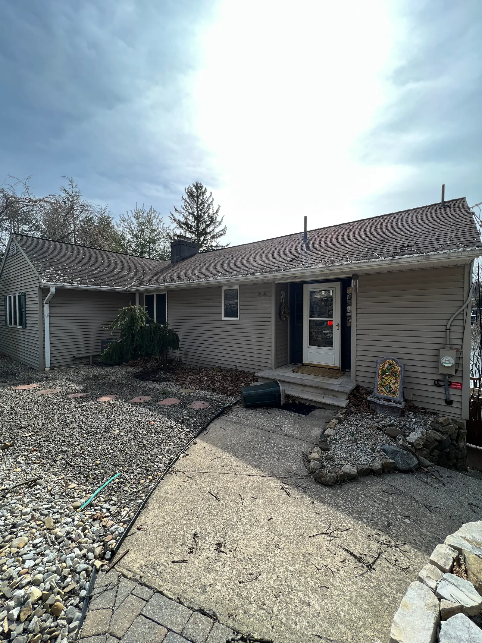 Dated lakefront home before renovation